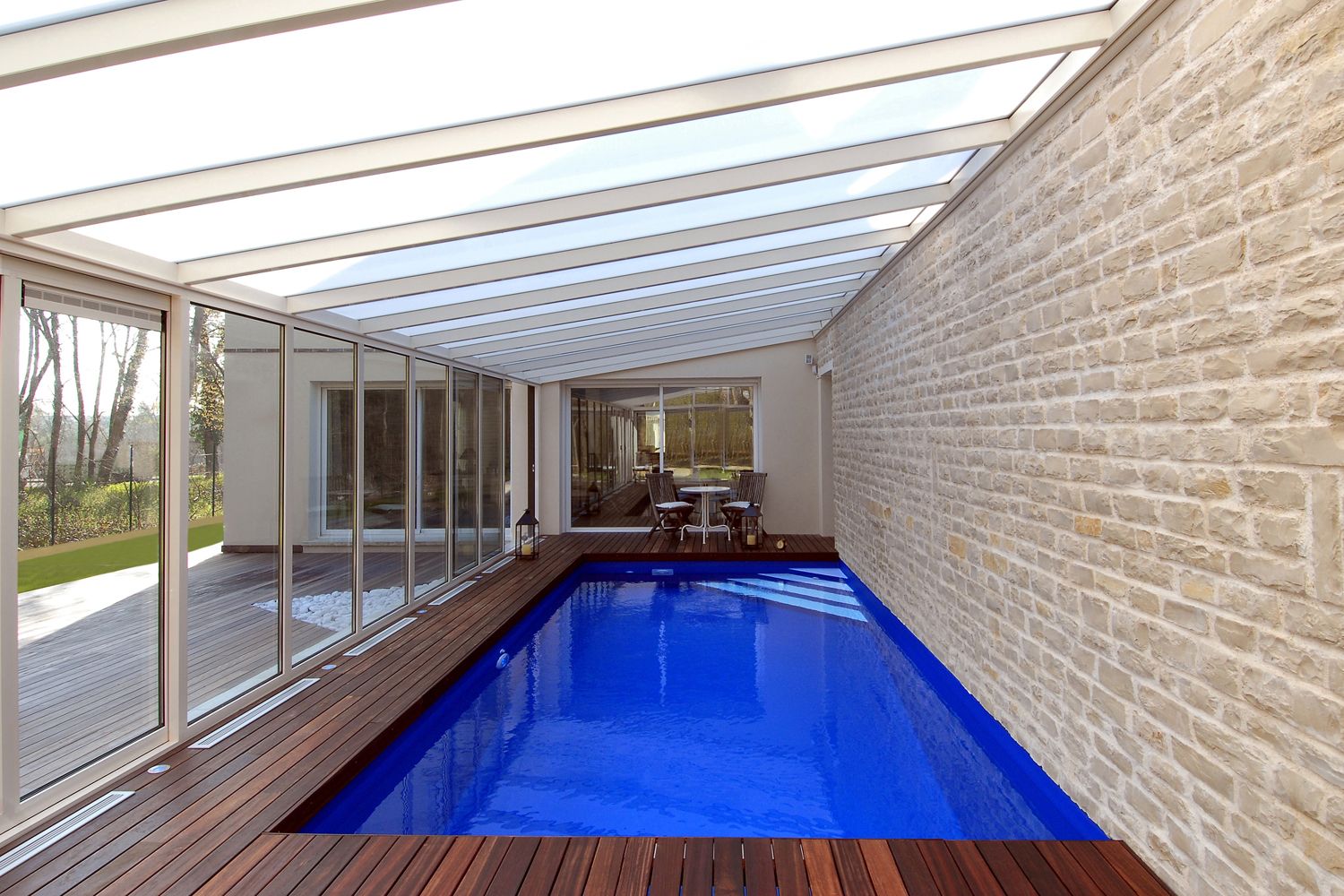 Véranda pour piscine en aluminium à toiture une pente | Cover Concept