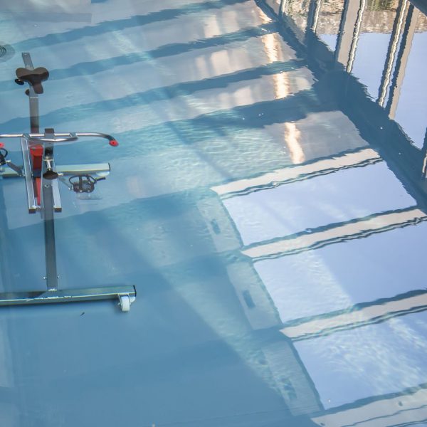 Aquabike dans une piscine sous véranda Cover Concept