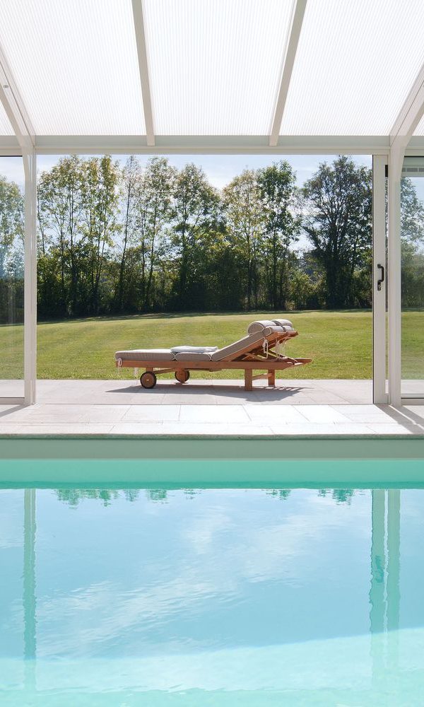piscine-ouverte-sur-exterieure-veranda-Cover-Concept